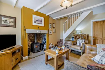 a living room with a tv and a fireplace at 2 Bed in Rowrah oc-s32232 in Rowrah