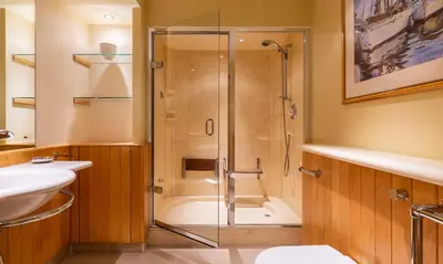 a bathroom with a shower and a sink at Underscar - Whinlatter in Keswick