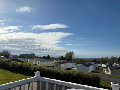 a view of a town from a balcony at Arran View Caravan in Ayr