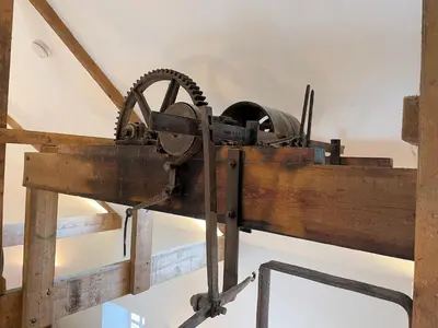 an old wooden machine on display in a museum at Outstanding Converted Mill in Beautiful Location - Pass the Keys in Gatehouse of Fleet