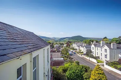 a view of a town with houses and a street at Baie Mooar House, Boutique B&B in Ramsey
