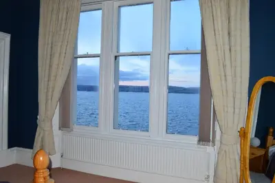 a window with a view of the water at Briar Brae Bed & Breakfast in Stranraer