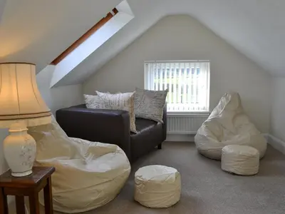 a living room with a couch and bean bag chairs at Crossfeld in Keswick