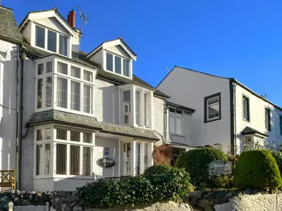 a row of houses with white windows at Skiddaw in Keswick