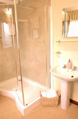 a bathroom with a shower and a sink at The Hill Hotel in Dumfries