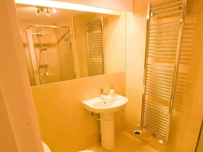 a bathroom with a sink and a shower at Carrigbaun in Braithwaite
