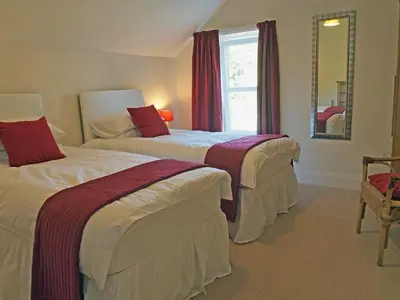 a hotel room with two beds and a window at Fairview in Rockcliffe