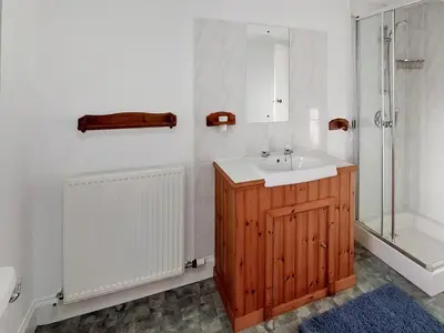 a bathroom with a sink and a shower at Culquhasen in Gillespie