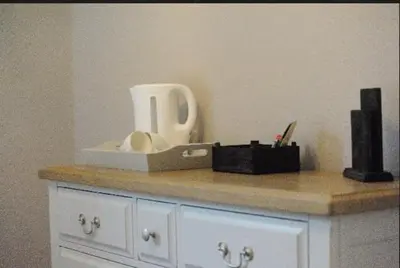 a counter top with a box and items on it at The Huntingdon in Dumfries