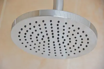 a shower head in a bathroom at Bailey Ground Hotel in Seascale