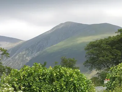 a view of a mountain with trees in the foreground at Beech Nut in Keswick