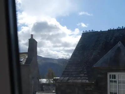 a view from a window of a roof of a house at 1 Tower Cottage in Portinscale