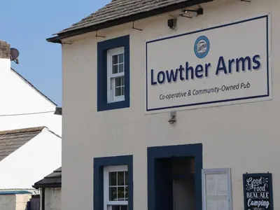a sign on the side of a building at West Croft in Mawbray