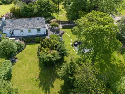 an aerial view of a house with a garden at Mell View Cottage in Watermillock