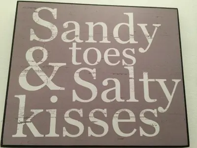 a sign that says samasyosasyasyasyasyasyasyasyasyasy at Troon Beachcombers in Troon