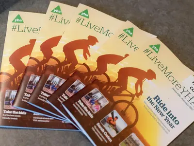 a magazine with a picture of a man riding a bike at YHA Buttermere in Buttermere