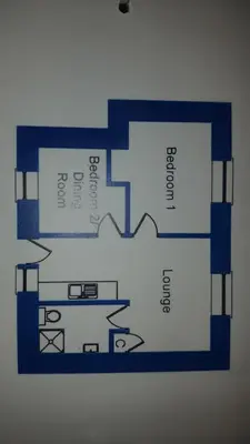 a floor plan of a house with blue at Silver Ridge, 2 House O` Hill in Newton Stewart