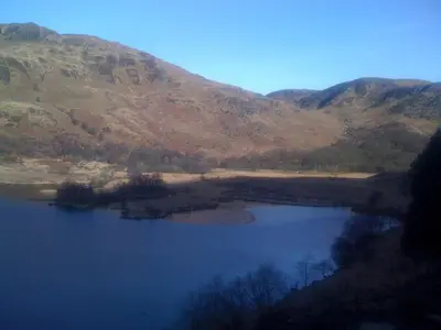 a view of a lake with mountains in the background at Silver Ridge, 2 House O` Hill in Newton Stewart