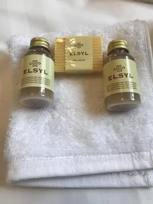a couple of bottles of essential oils on a towel at Rickerby Grange in Keswick