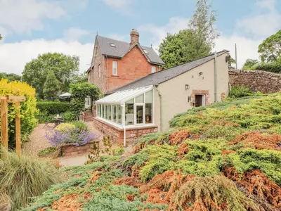 a house on top of a hill at North Lodge in Annan