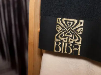 a close up of a black and white patch on a bed at Reflection in Canonbie