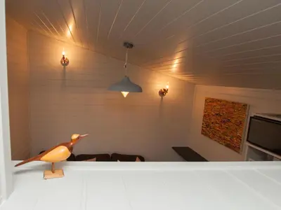 a bird statue sitting on a counter in a room at Reflection in Canonbie