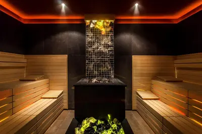 a sauna with a hot tub at Langdale Hotel & Spa in Ambleside