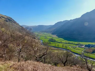 a view of a valley with a river and mountains at Castle Howe in Rosthwaite