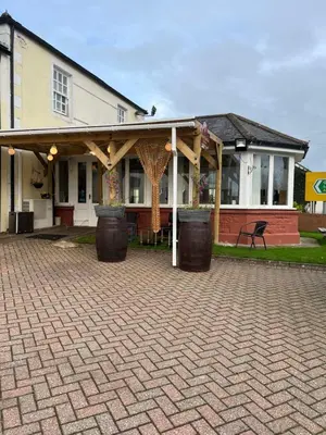 a house with a pavilion in front of it at Lynebank House Hotel, Bed & Breakfast in Carlisle