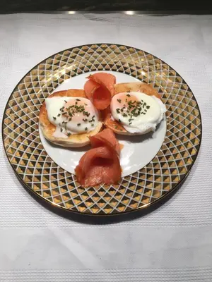 a plate of food with eggs and tomatoes on it at Retreat at The Knowe Auchincruive Estate in Ayr