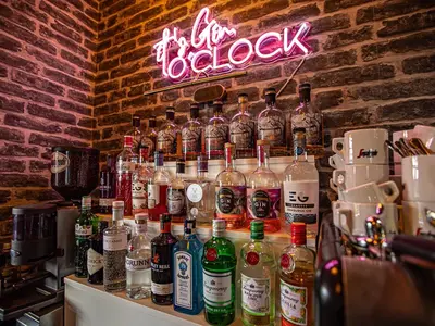 a bar with a bunch of bottles of alcohol at Sure Hotel by Best Western Lockerbie in Lockerbie