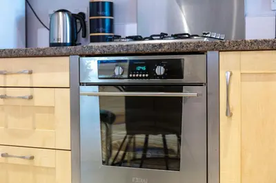 a stainless steel oven in a kitchen with a counter at Elliot Suite No2 - Donnini Apartments in Ayr