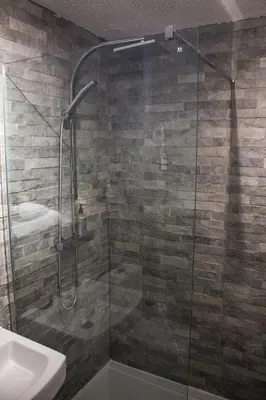 a bathroom with a shower and a sink at No27 Ayr Beach - Coorie Doon Stays in Ayr