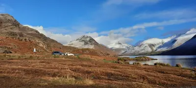 a view of a mountain range with a lake at Strands Hotel/Screes Inn & Micro Brewery in Nether Wasdale