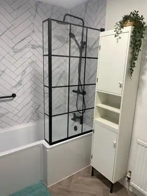 a glass shelf in a bathroom with a shower at Lovely house next to Euchan River in Sanquhar