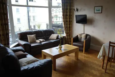 a living room with a couch and a coffee table at Rosslyn in Douglas