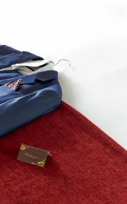 a lap top sitting on top of a red carpet at Ellan Vannin Hotel in Douglas