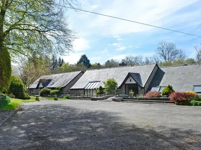 a large home with a gray roof at Anvil in Dalbeattie