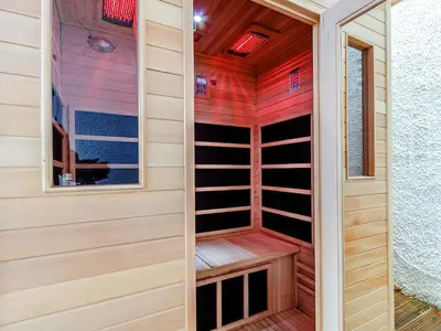 a sauna with wood paneling and a window at The Golden Crown in Tarbolton