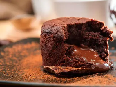 a chocolate cake sitting on top of a plate at ibis Carlisle City Centre in Carlisle