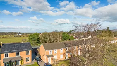 an aerial view of a house with a roof at Cosy Apartment in Wetheral,Cumbria in Wetheral
