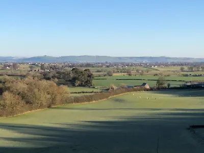 a view of a lush green golf course at Woodend in Maxwelltown