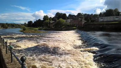 a river with lots of rapids on it at Number 48 in Dumfries