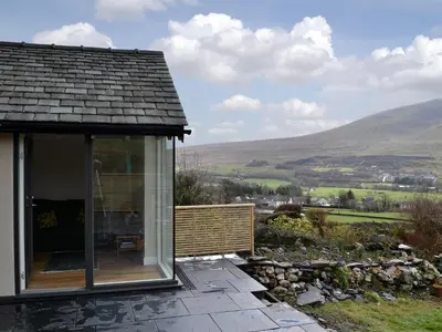 a cottage with a view of the hills at Cottam Road in Threlkeld