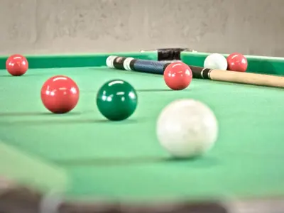 a game of snooker and balls on a pool table at The Brewers Cottage in Mauchline