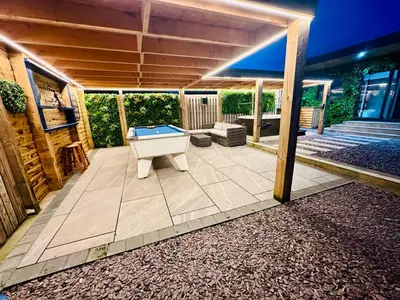 a covered patio with a pool table on it at Hazells Lodge Farm Stay Sleeps 2 Undercover Hottub and Pool Table in Galston