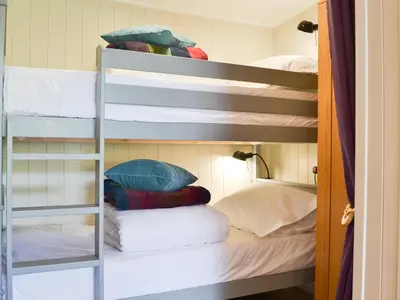 a bunk bed room with several bunk beds at Curlew in Westward