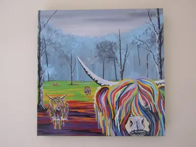 a painting of a cow standing in a river at Hunters Lodge Hotel in Gretna Green