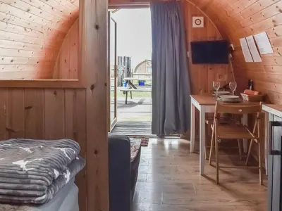 a room with a bed and a desk and a table at Black Coombe-Uk1392 in Corney