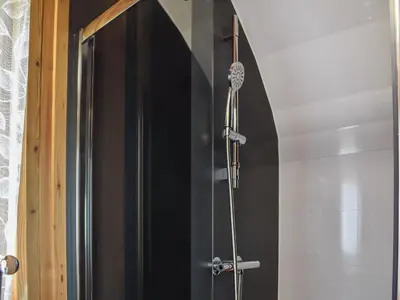 a shower in a bathroom with a black door at Withy Bottom-Uk1393 in Corney